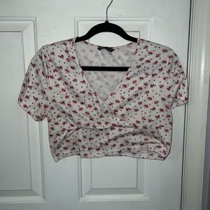 White with red flowers crop top.